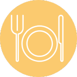 white utensils and plate on orange background